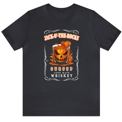 Charcoal Halloween Jack Whiskey Label Tshirt with Jack-o-the-Rocks title over a jack-o-lantern submerged in a lowball glass with filled with whiskey. The bottom of the label reads "Cursed Sour Mash Whiskey."