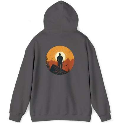 Dark Grey hoodie full back graphic that shows a mountain climber in silhouette staring at a mountain range at sunrise that's covered in an orange haze from the sun.