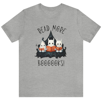 Grey graphic tee showing three ghosts reading books in a spooky scene. Perfect for teachers, librarians, school staff, students, or anyone looking for classroom fun.