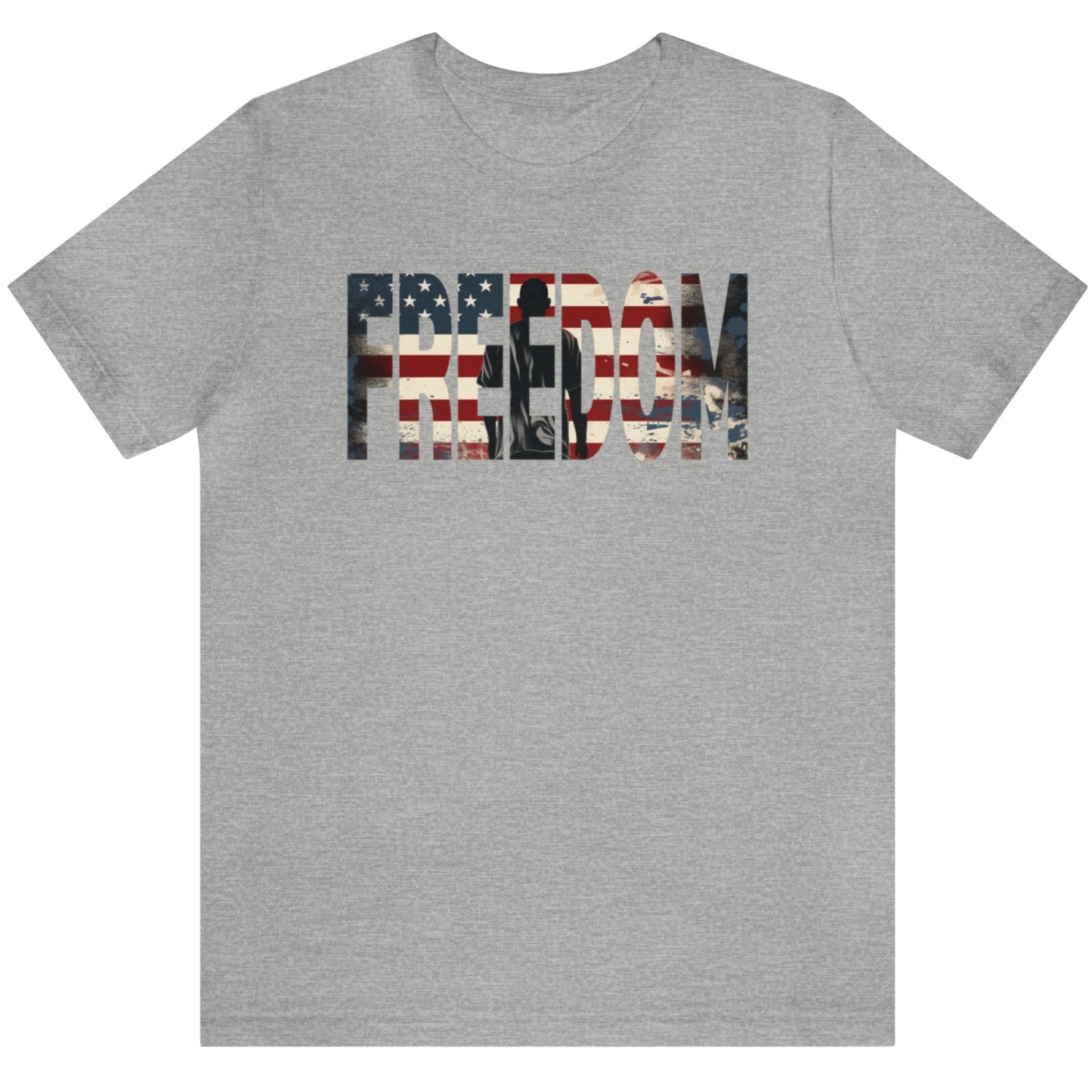 Grey Freedom USA Flag tee, which embodies the spirit of liberty and individualism. An American flag is outlined in the word 'Freedom' with a young man in silhouette gazing toward the stars and stripes, his back turned in reverence.