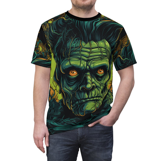 Man wearing our Frankenstein 'Electric' all-over-print graphic tee! Frank gets a close-up after jolts of electricity surged through him, illuminating every scar, stitch, and bolt. Perfect for horror lovers, Frankenstein fans, or anyone looking to make a bold statement on Halloween.