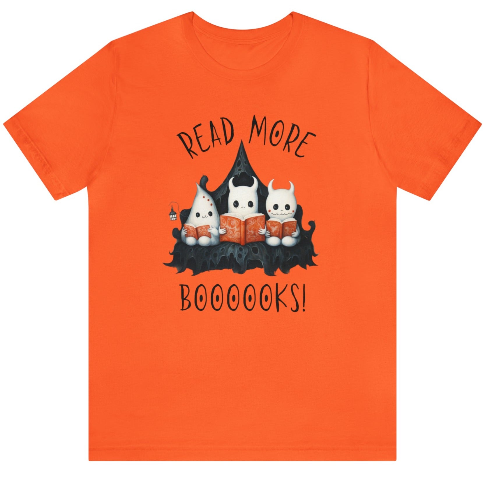 Orange graphic tee showing three ghosts reading books in a spooky scene. Perfect for teachers, librarians, school staff, students, or anyone looking for classroom fun.