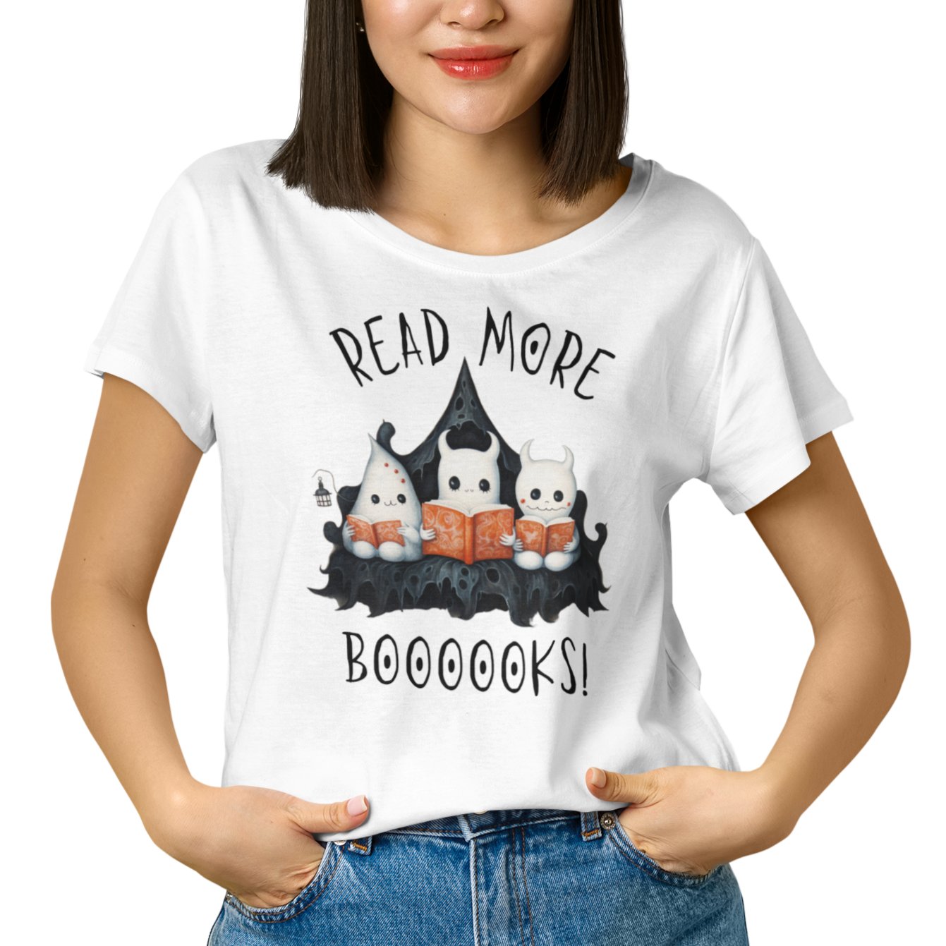 Woman wearing white graphic tee showing three ghosts reading books in a spooky scene. Perfect for teachers, librarians, school staff, students, or anyone looking for classroom fun.