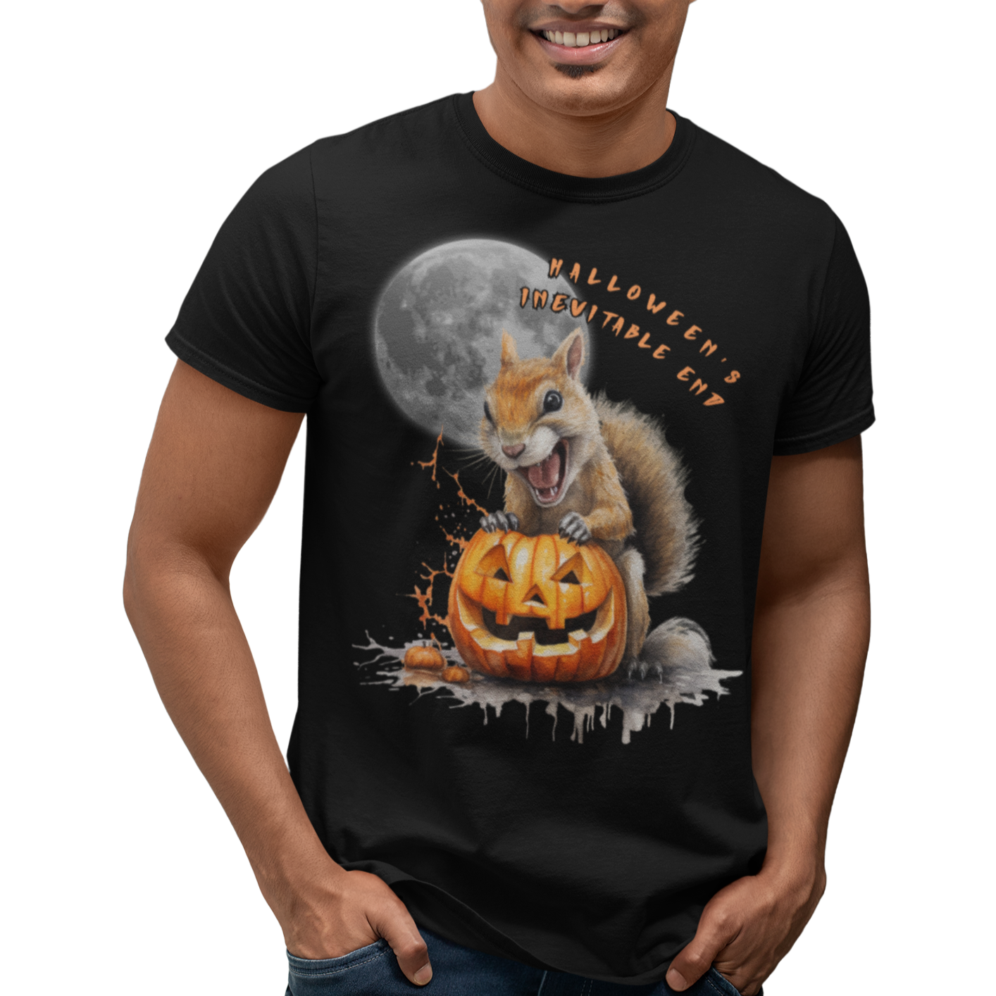 Man wearing our 'Halloween's Inevitable End' Squirrel Feast graphic tee featuring a squirrel feasting on a jack-o'-lantern under the moon. It will bring a smile to anyone who sees it. Wear it Halloween parties or in the aftermath of Halloween.