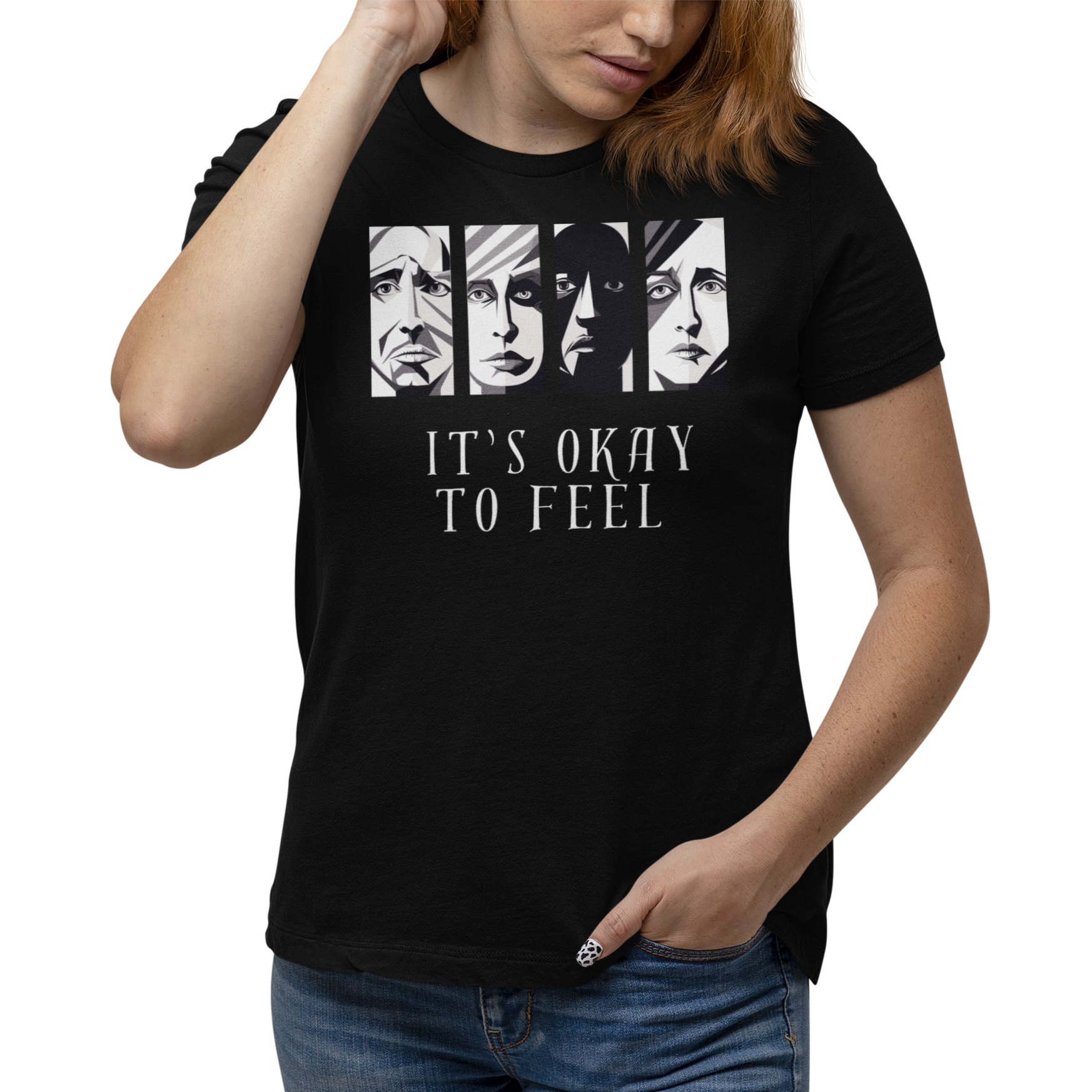 Woman wearing black mental health awareness t-shirt with four faces arranged horizontally across the shirt with the phrase 'It's Okay to Feel' below. Each face represents real emotions. Perfect for mental health advocates.